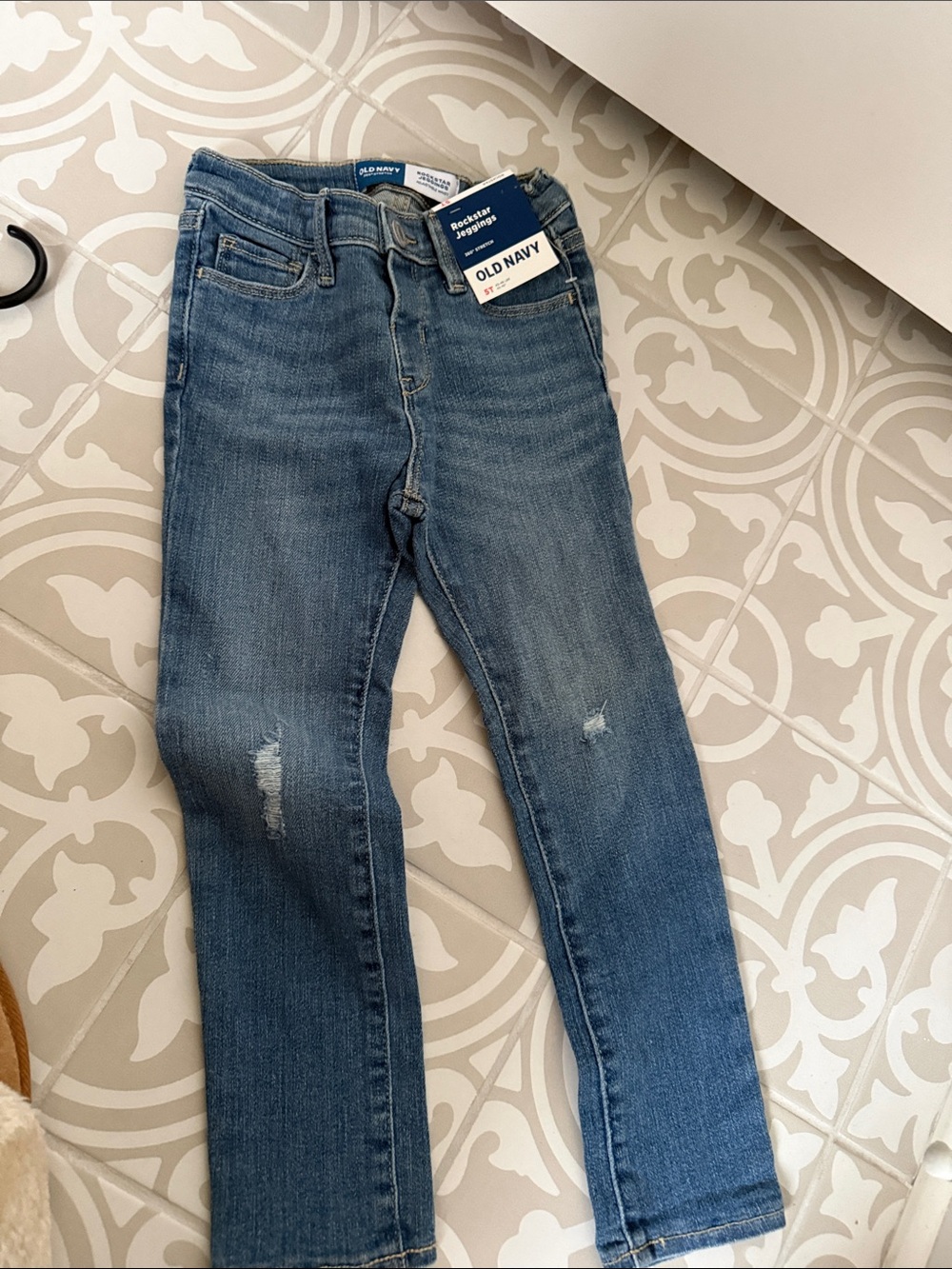 Old Navy Medium Blue Skinny Jeans with Light Distress. See my listings